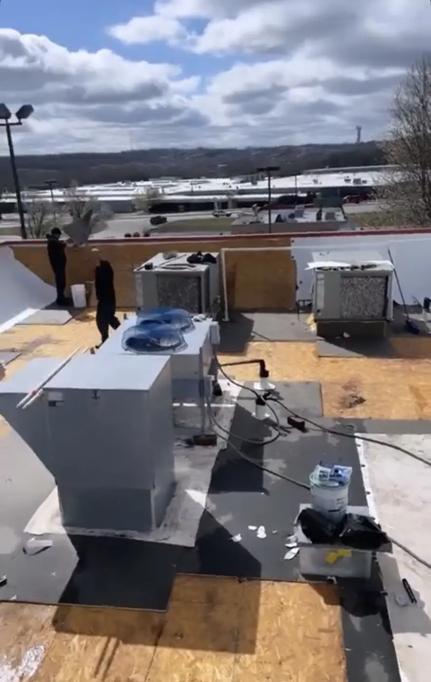 Rooftop units during a commercial re-roof